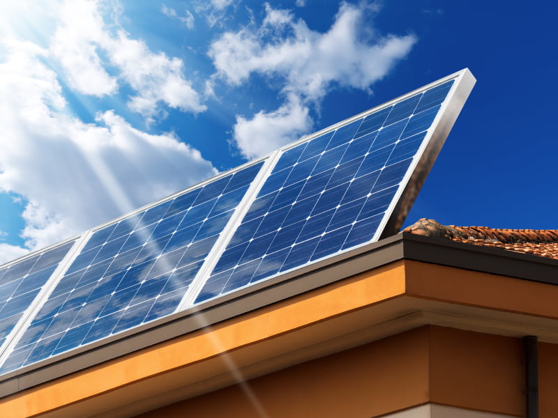 close up of several solar panels installed on a houses roof buckeye az